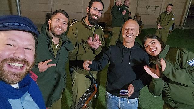 With smiling IDF soldiers at Sdei Teiman